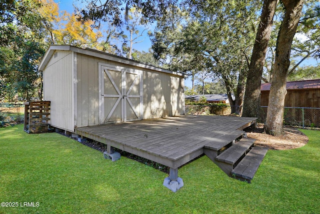 view of shed with fence