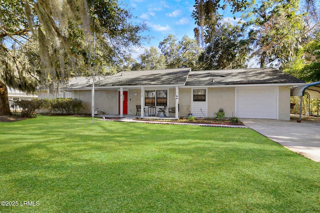 view of front facade featuring a porch, a garage, concrete driveway, stucco siding, and a front yard