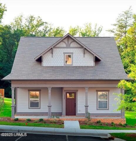 1929 Bluff Rd Unit 25, Columbia, SC 29201 - view of front facade featuring covered porch and roof with shingles
