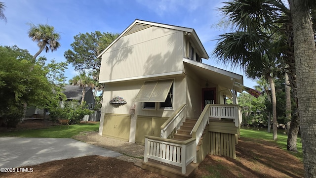 129 Sea Otter Ln, Fripp Island, SC 29920 - view of front of property with stairs and a front lawn