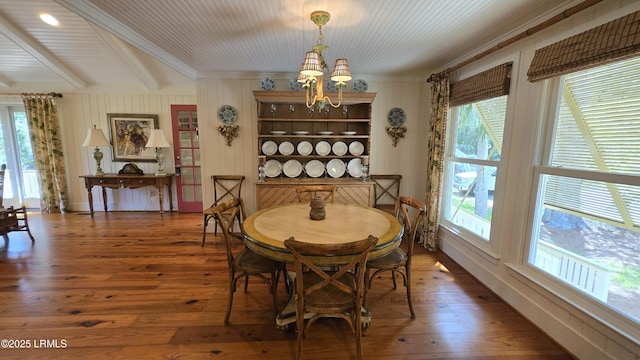 129 Sea Otter Ln, Fripp Island, SC 29920 - dining space with crown molding, a chandelier, hardwood / wood-style floors, and beamed ceiling