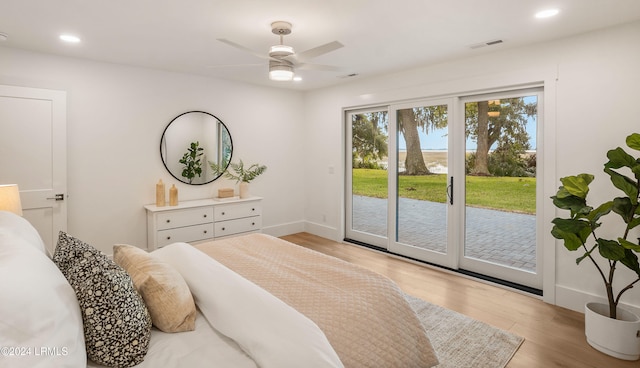 bedroom featuring access to outside, ceiling fan, and light hardwood / wood-style flooring