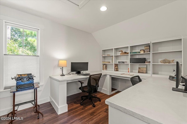 office area with vaulted ceiling and dark hardwood / wood-style floors