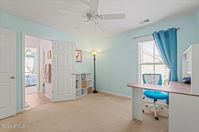 office with light colored carpet and ceiling fan