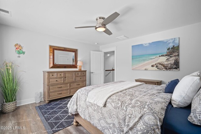 276 Monument St, Ridgeland, SC 29936 - bedroom with wood finished floors, baseboards, and ceiling fan