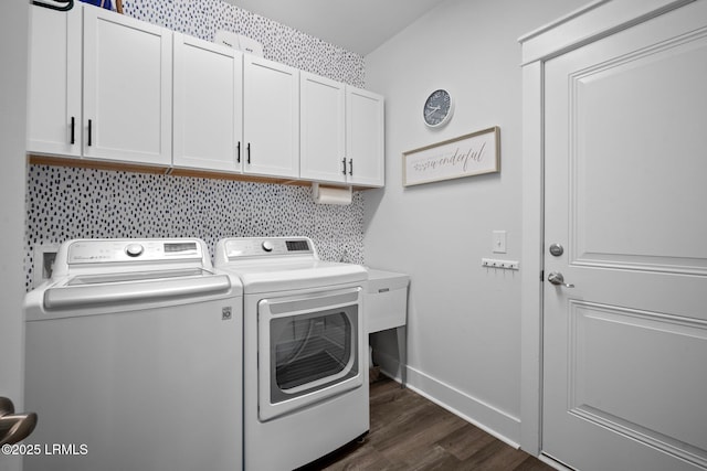 276 Monument St, Ridgeland, SC 29936 - washroom featuring separate washer and dryer, cabinet space, dark wood-style flooring, and baseboards