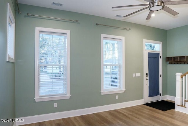 foyer entrance featuring hardwood / wood-style floors and ceiling fan