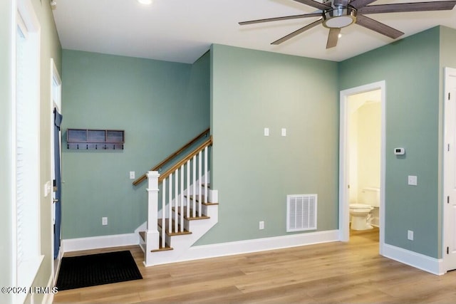 foyer featuring ceiling fan and light hardwood / wood-style flooring