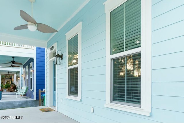 exterior space featuring ceiling fan and a porch