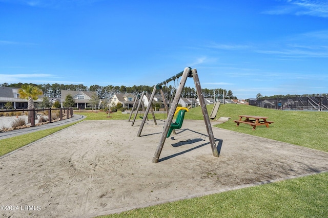 view of playground featuring a yard