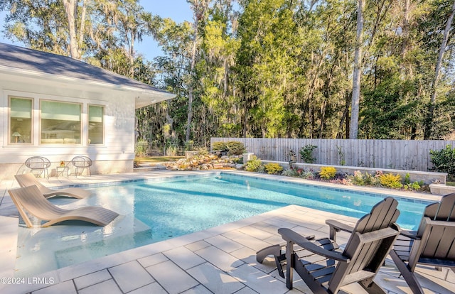 view of pool with a patio area