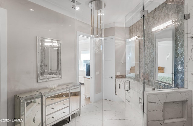 bathroom with crown molding, plenty of natural light, vanity, and walk in shower