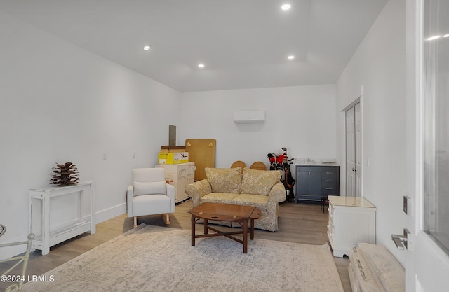 living area with light hardwood / wood-style flooring