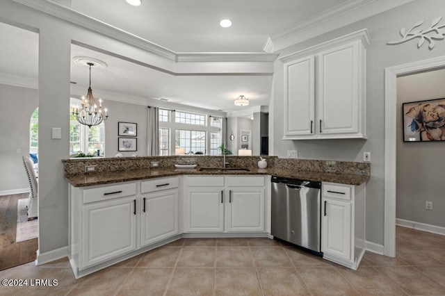 kitchen with a sink, a healthy amount of sunlight, crown molding, and stainless steel dishwasher