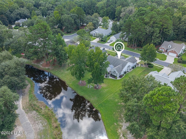 bird's eye view featuring a water view and a residential view