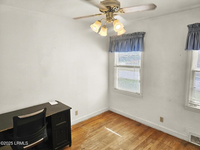 kitchen featuring washer / clothes dryer, white cabinetry, white refrigerator with ice dispenser, and ceiling fan