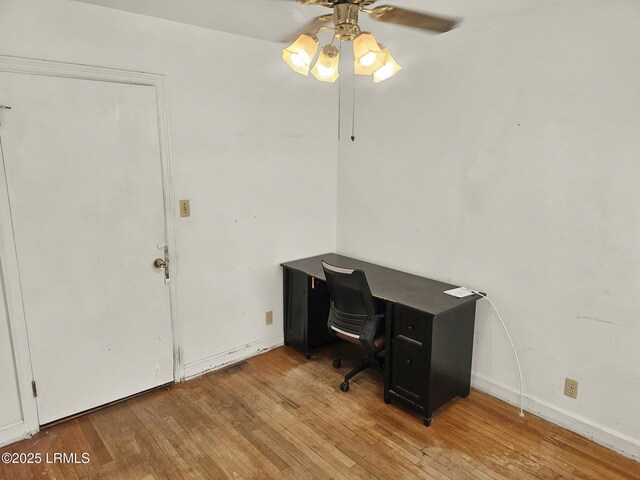 kitchen featuring white cabinets and stainless steel refrigerator with ice dispenser