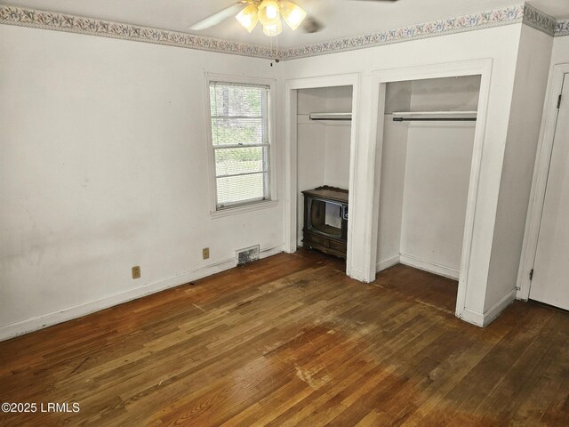 full bathroom with tile walls, vanity, shower / bath combo, and toilet