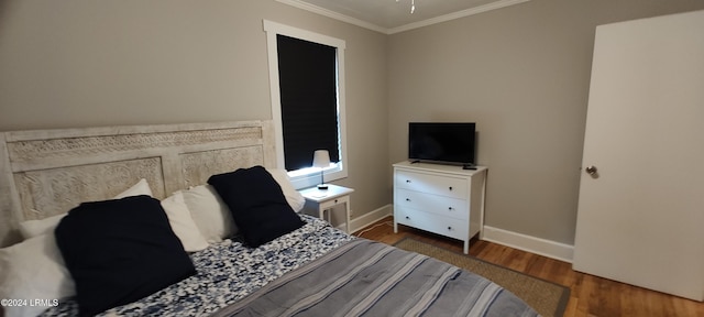 607 Waight St, Beaufort, SC 29902 - bedroom with crown molding and dark hardwood / wood-style flooring