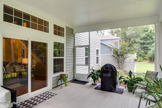 sunroom / solarium featuring a wealth of natural light