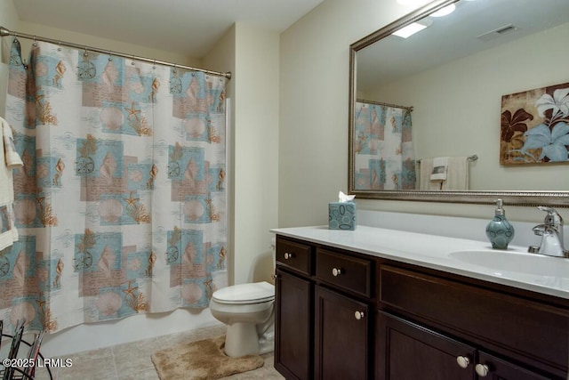 full bathroom with vanity, shower / tub combo, and toilet