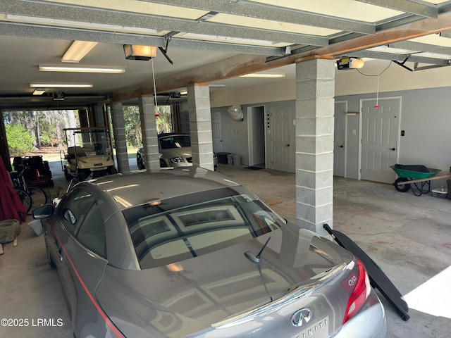 garage featuring a garage door opener