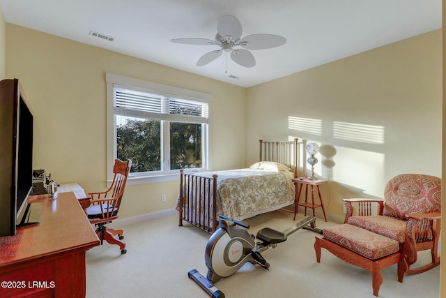 bedroom featuring visible vents, carpet floors, baseboards, and a ceiling fan