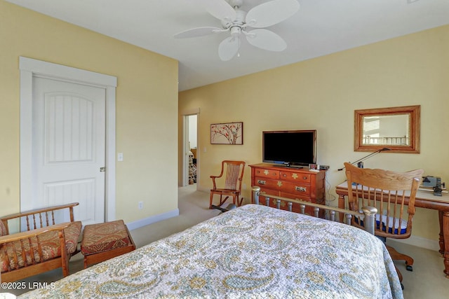 carpeted bedroom with baseboards and ceiling fan