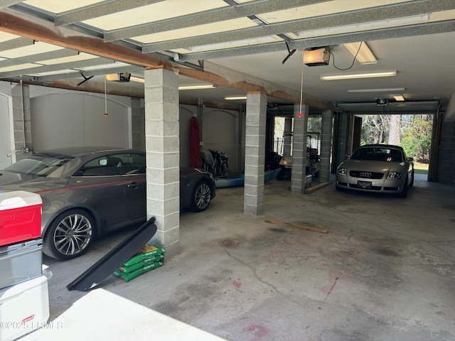 garage featuring a garage door opener