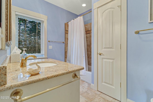 full bathroom with shower / bathtub combination with curtain and vanity