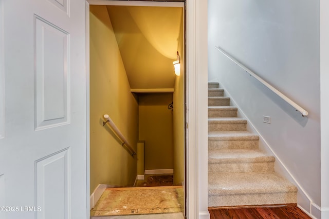 77 Tuscarora Ave, Beaufort, SC 29907 - staircase featuring baseboards and wood finished floors