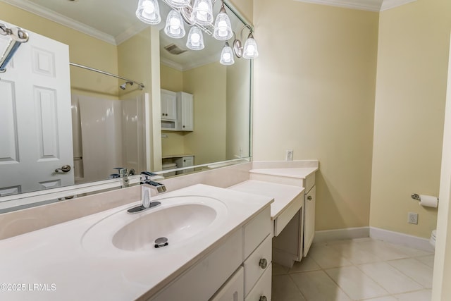 77 Tuscarora Ave, Beaufort, SC 29907 - bathroom featuring visible vents, baseboards, ornamental molding, vanity, and tile patterned flooring