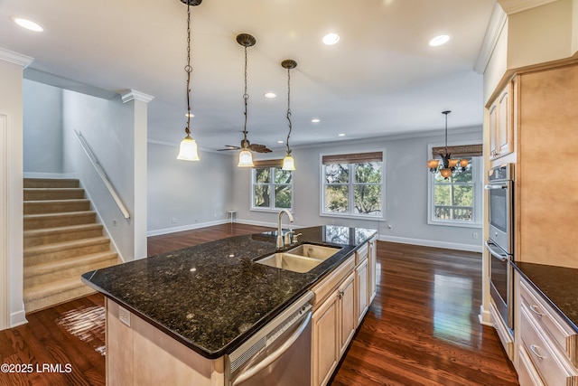 77 Tuscarora Ave, Beaufort, SC 29907 - kitchen with appliances with stainless steel finishes, baseboards, dark wood finished floors, ceiling fan with notable chandelier, and a sink