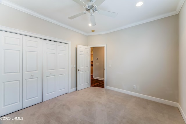 77 Tuscarora Ave, Beaufort, SC 29907 - unfurnished bedroom with a closet, carpet flooring, baseboards, and ornamental molding