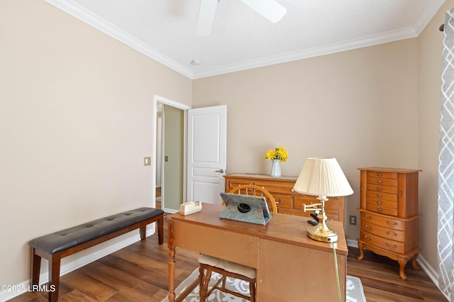 office area with baseboards, crown molding, ceiling fan, and wood finished floors