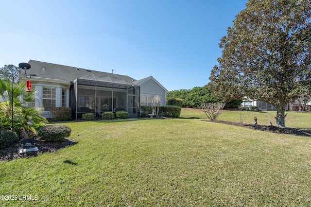 view of yard with a lanai