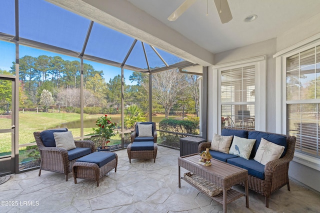 sunroom / solarium featuring an outdoor living space and ceiling fan