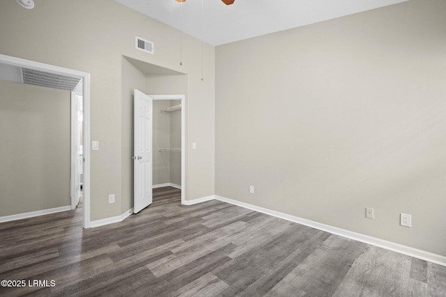 897 Fording Island Rd Unit 209, Bluffton, SC 29910 - unfurnished bedroom featuring wood finished floors, baseboards, and ceiling fan