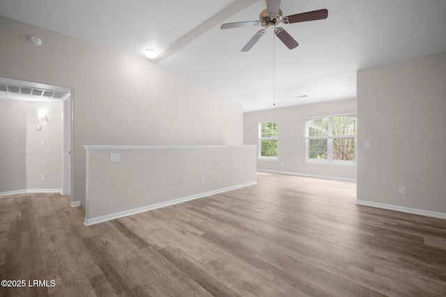 897 Fording Island Rd Unit 209, Bluffton, SC 29910 - empty room featuring ceiling fan, wood finished floors, lofted ceiling, and baseboards
