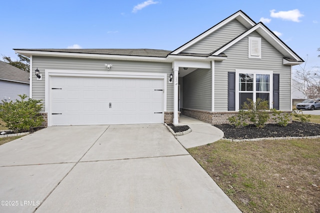 single story home with a garage, concrete driveway, and brick siding