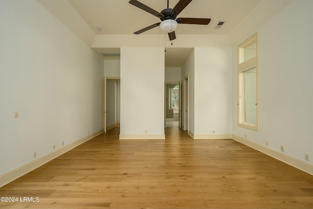 empty room featuring ceiling fan and light wood-type flooring