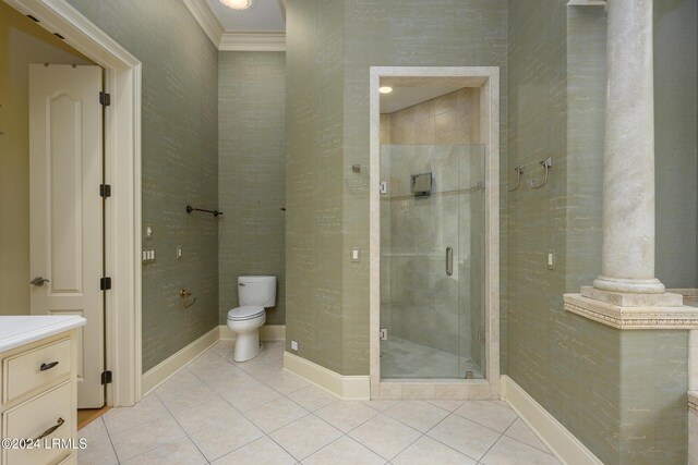 bathroom with crown molding, toilet, an enclosed shower, and tile patterned flooring