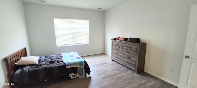 12 Pacolet Ln, Beaufort, SC 29906 - bedroom featuring wood finished floors and baseboards