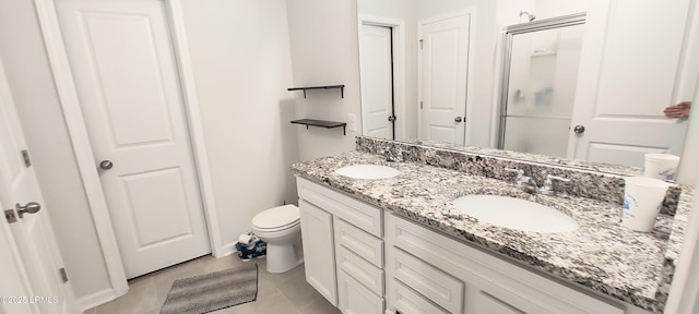12 Pacolet Ln, Beaufort, SC 29906 - full bath with double vanity, toilet, a shower with door, and baseboards