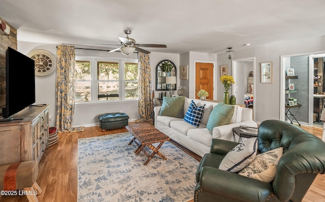 701 Battery Creek Rd, Beaufort, SC 29902 - living area featuring baseboards, wood finished floors, and a ceiling fan