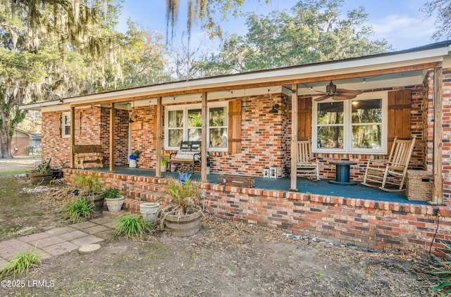 701 Battery Creek Rd, Beaufort, SC 29902 - rear view of property with brick siding and a porch