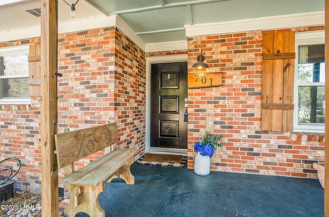 701 Battery Creek Rd, Beaufort, SC 29902 - view of exterior entry with visible vents and brick siding