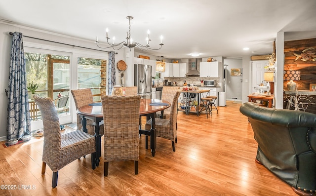 701 Battery Creek Rd, Beaufort, SC 29902 - dining area featuring light wood finished floors and a notable chandelier