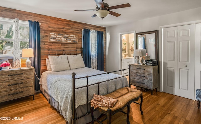 701 Battery Creek Rd, Beaufort, SC 29902 - bedroom featuring light wood-style flooring, ensuite bath, and a ceiling fan