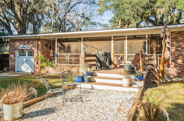 701 Battery Creek Rd, Beaufort, SC 29902 - back of house with brick siding and a sunroom